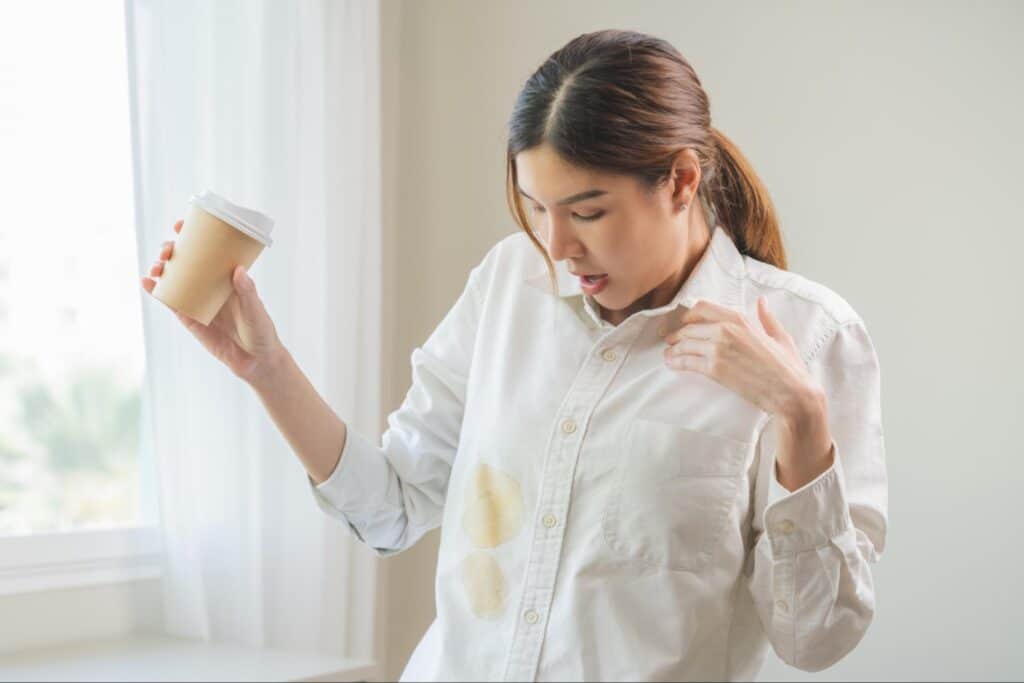 A white shirt with a noticeable stain on the front