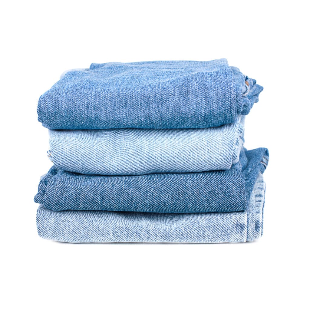 Stack Of Jeans Isolated On A White Background