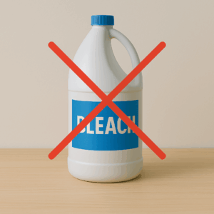 A close-up of a clothing care label with various laundry care symbols on it.