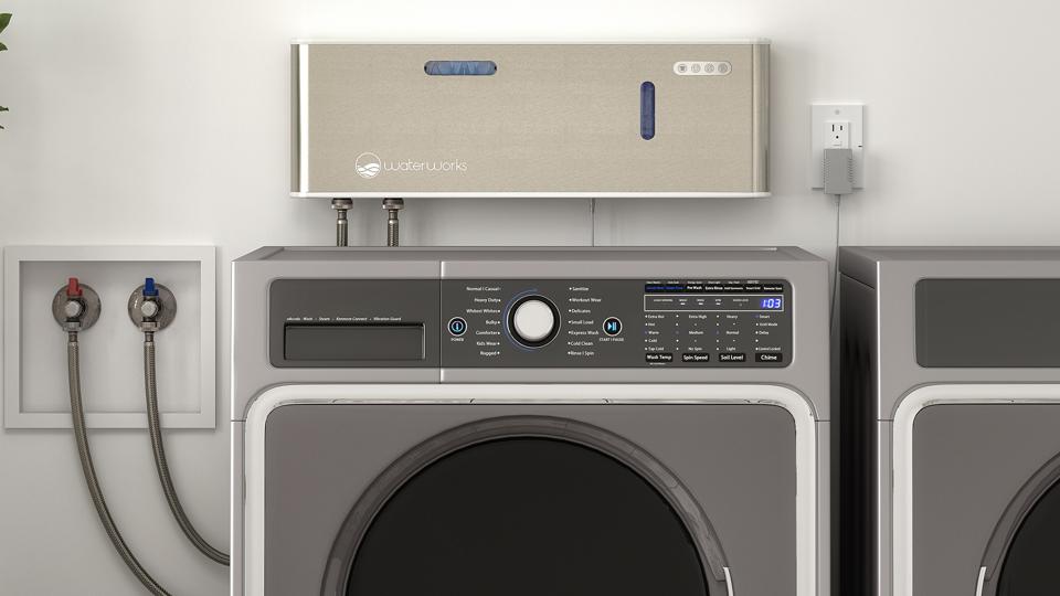 Close-up of an ozone laundry system device attached to a washing machine