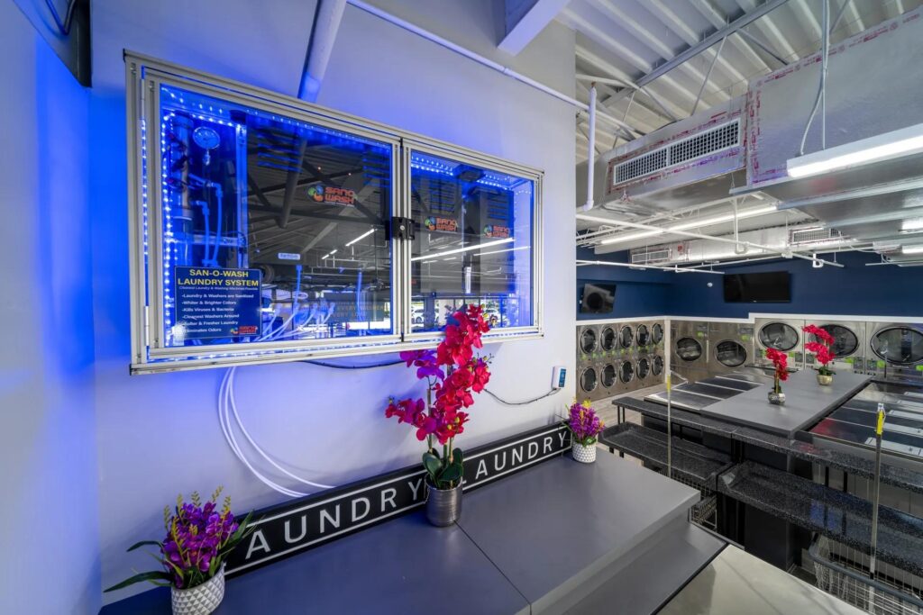 Commercial laundry machines in a hotel using an ozone sanitizing system