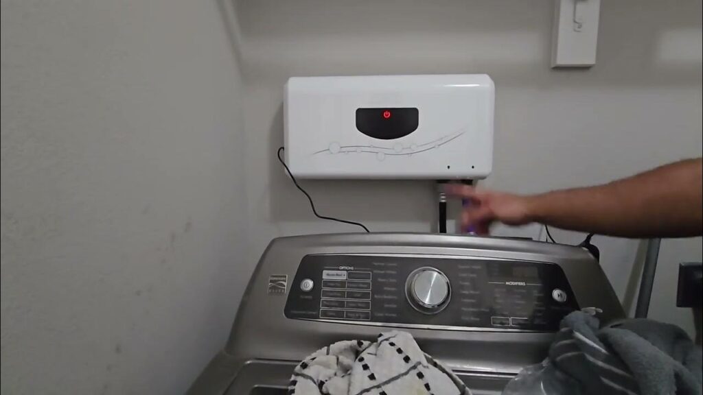 Technician installing an ozone laundry system safely on a washing machine