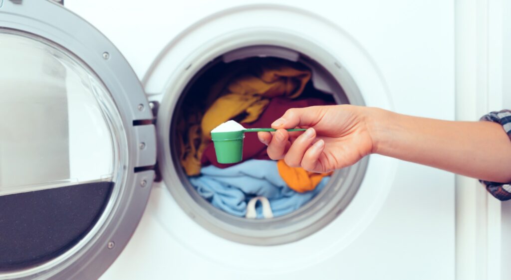 Adding whitening powder to a front load washer
