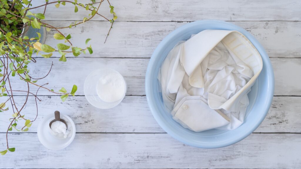 Clothes soaking in water to remove detergent residue