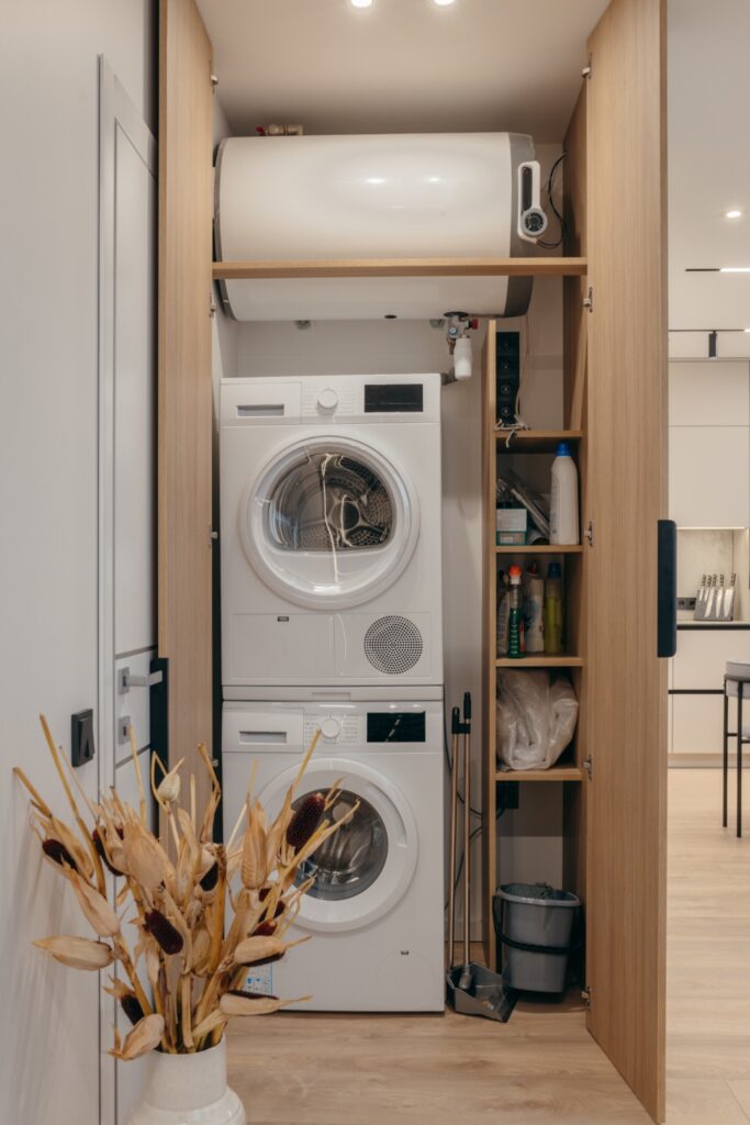 Stacked washer and dryer in a narrow laundry closet