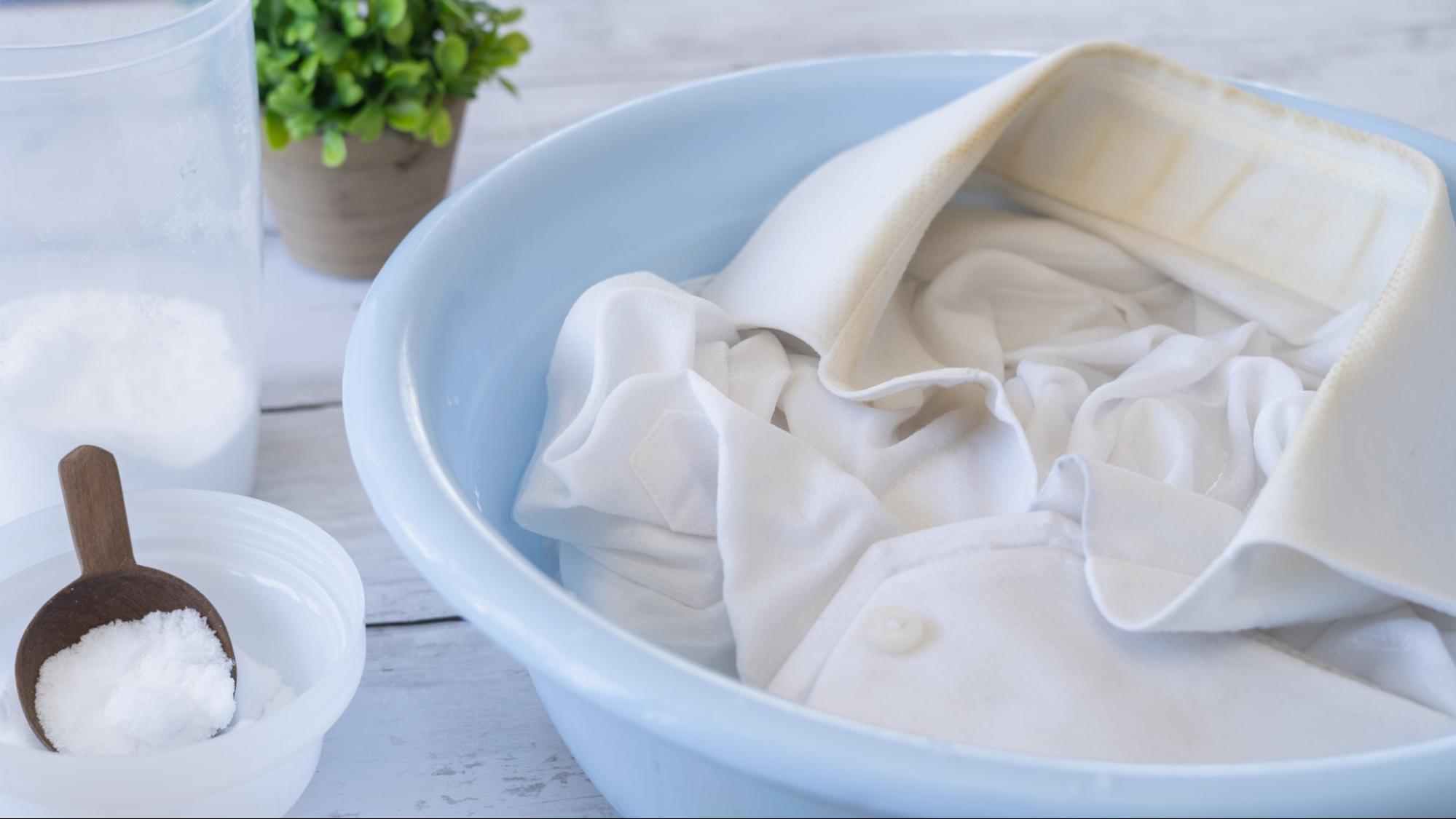 White shirt soaking in water with detergent